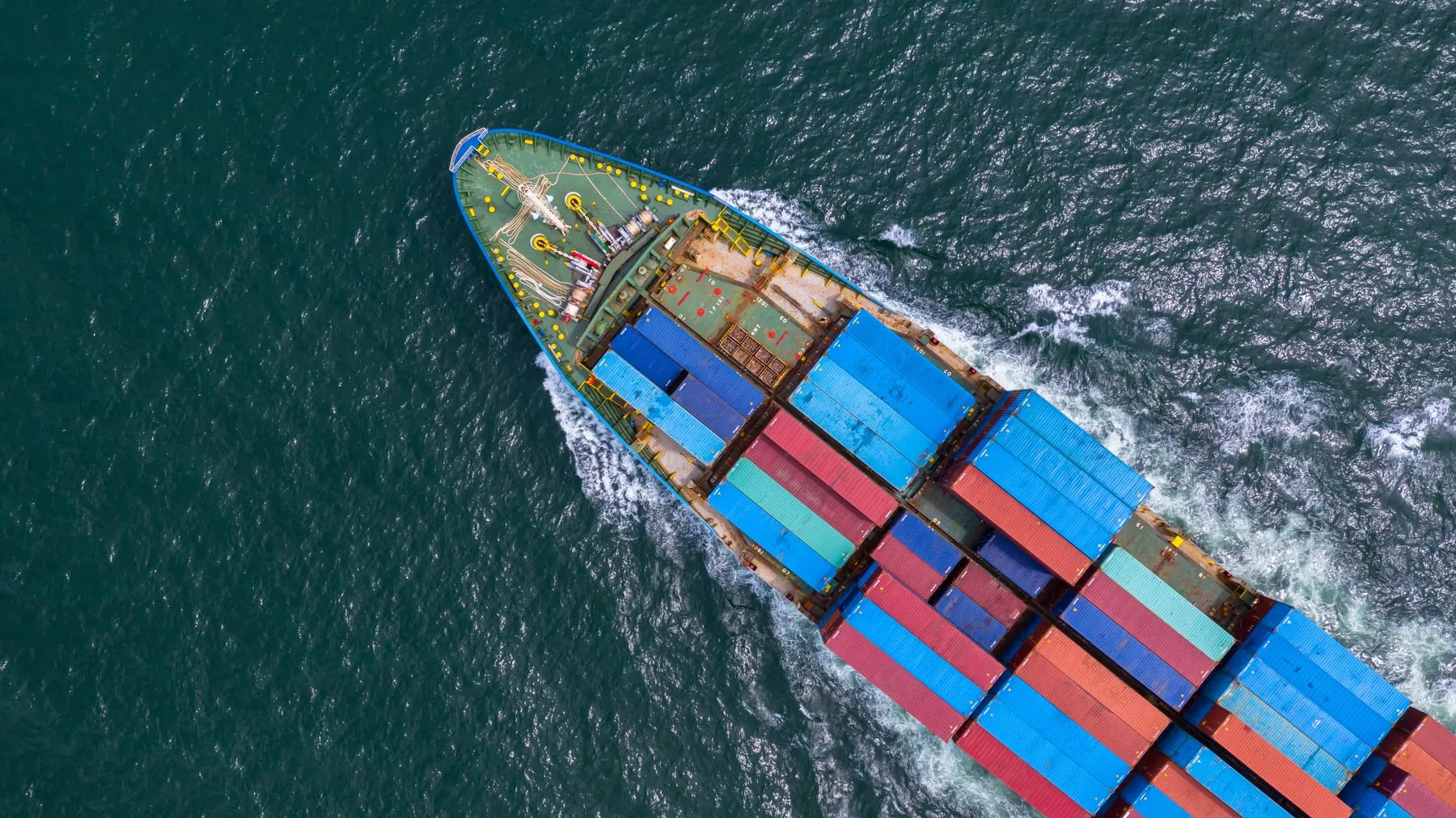 Aerial view container ship carrying container import export business logistic transportation international by container ship open sea