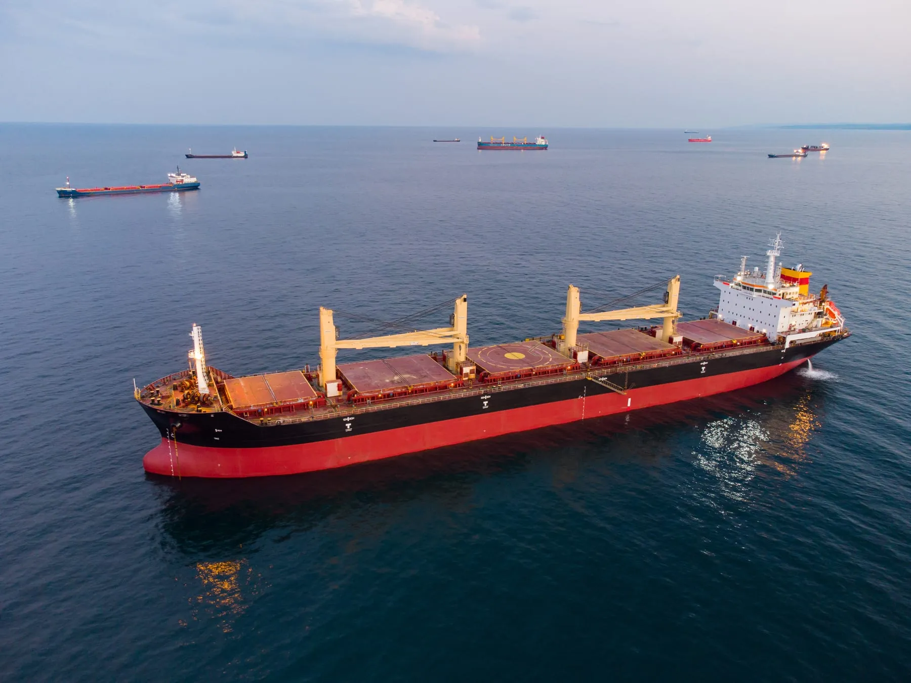 Large general cargo ship tanker bulk carrier aerial view night
