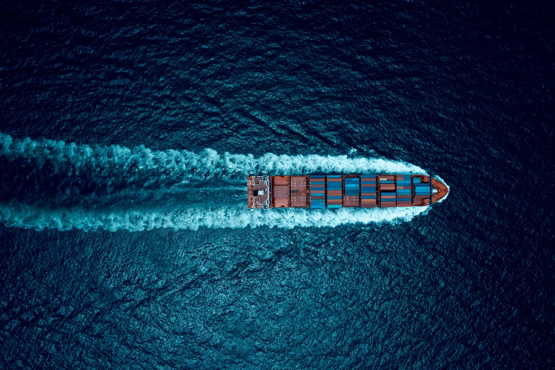 Container ship import export marine goods dealers consumers across pacific
