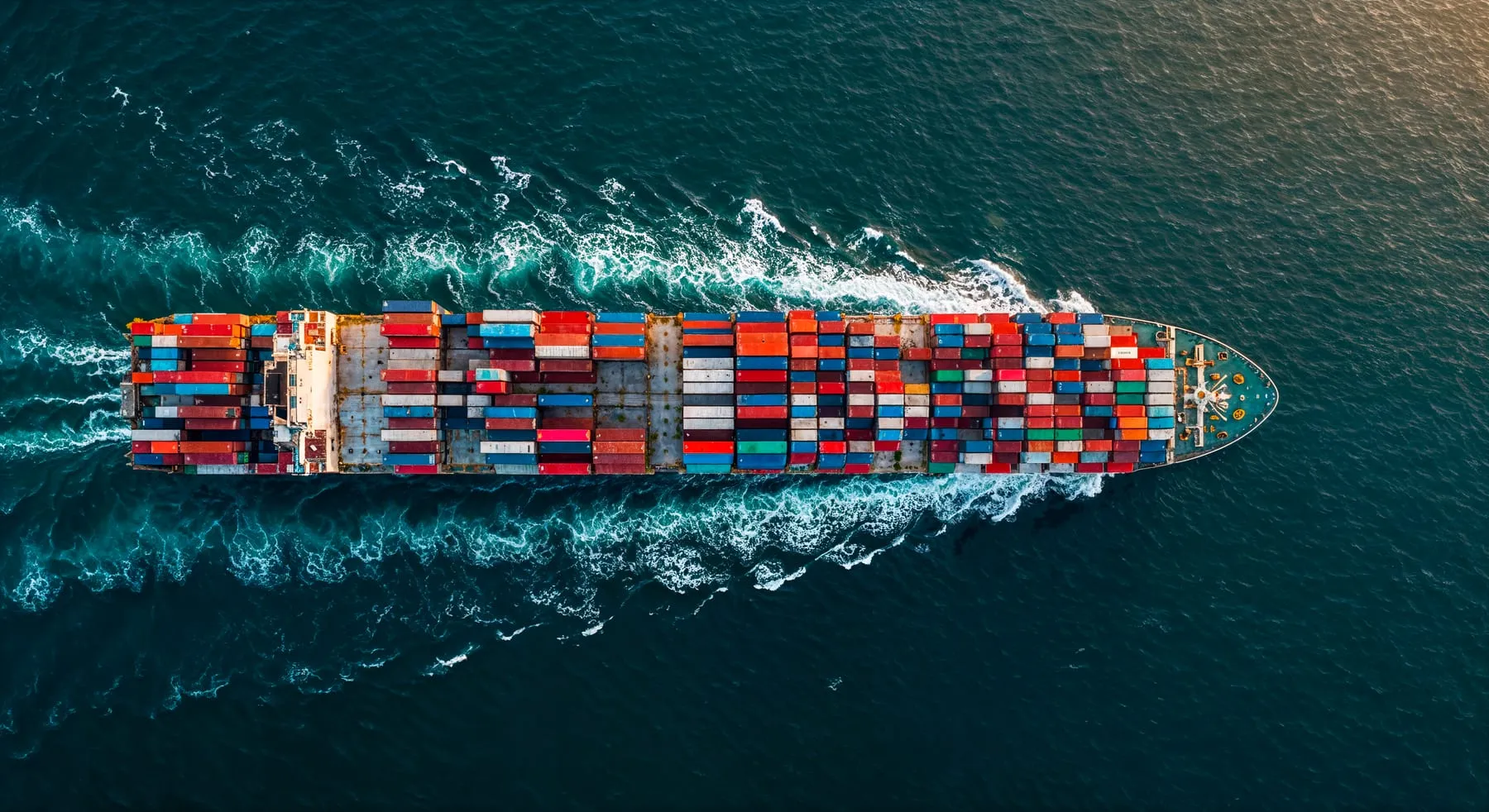 Aerial view of a container ship sailing the open ocean